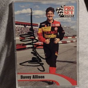 1992 Pro Set racing card . Autographed Davey Allison card in plastic cover.